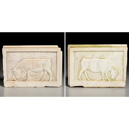 Pair Ptolemaic style marble Bull relief panels
