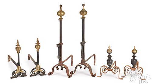 Two pairs of wrought iron Continental andirons
