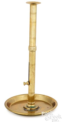 Tall English brass side ejector candlestick
