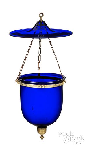 Hanging blue glass bell jar chandelier