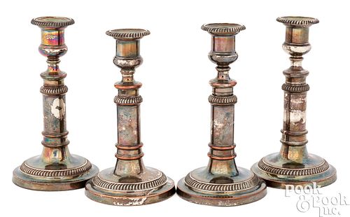 Set of four Sheffield silver plate candlesticks