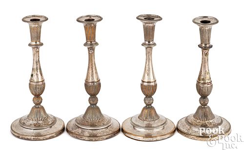 Set of four Sheffield candlesticks