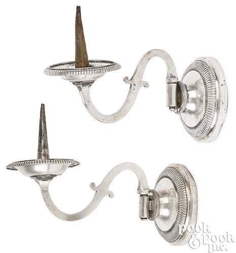 Pair of silver pricket stick sconces, 18th c.