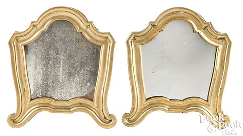 Pair of Continental cast brass mirrors