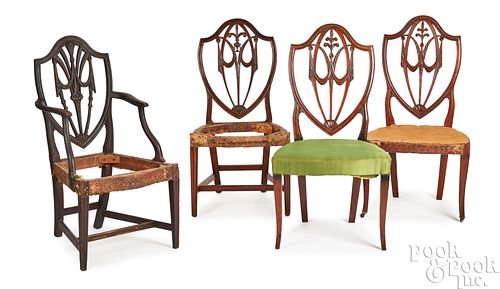 Four Hepplewhite mahogany shieldback dining chairs