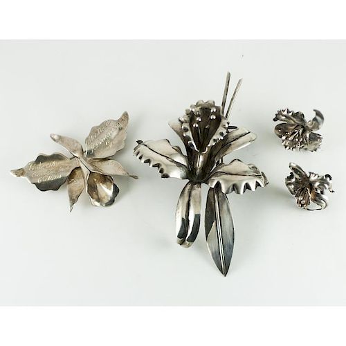 Hector Aguilar (Mexican, 1905-1986) Silver Flower Brooch and Other Mexican Silver Flower Jewelry