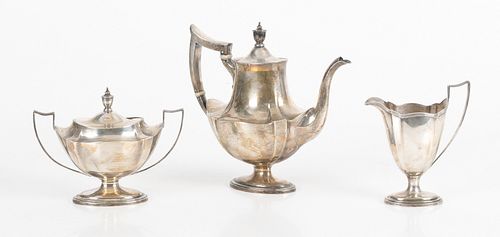 A Three Piece Sterling Silver Tea Set 