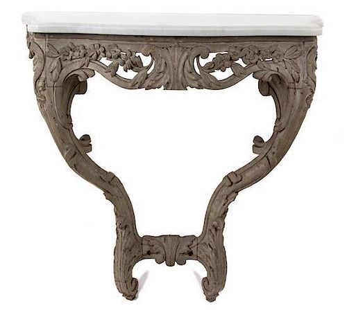 A Continental Rococo Style Carved and Painted Marble Top Console Table Height 32 1/2 x width 31 x depth 18 inches.