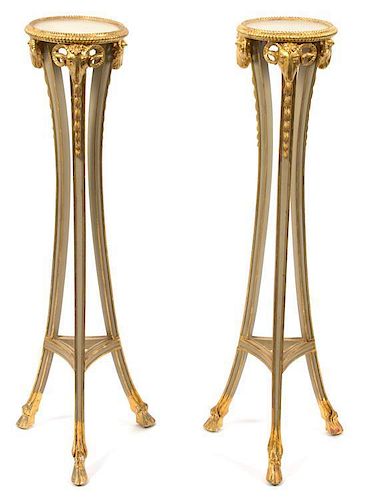 A Pair of Neoclassical Style Painted and Parcel Gilt Torchere Stands Height 40 3/4 inches.