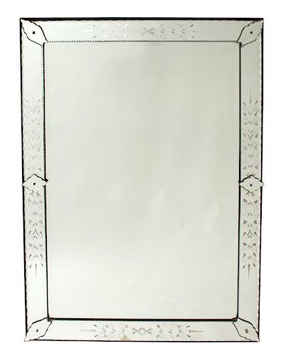 A Venetian Glass Mirror Height 53 x width 38 inches.