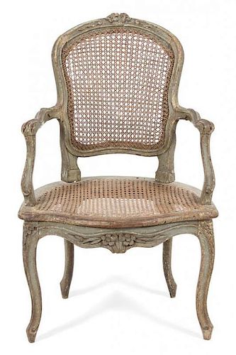 A Louis XV Carved and Painted Fauteuil Height 36 inches.