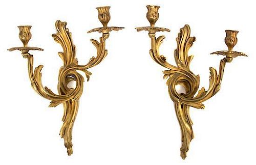 A Pair of Louis XV Gilt Bronze Two-Light Wall Sconces Height 13 1/2 x width 10 1/2 x depth 6 inches.