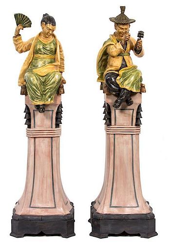 A Pair of Carved Wood Figures Height of taller 66 1/2 inches.
