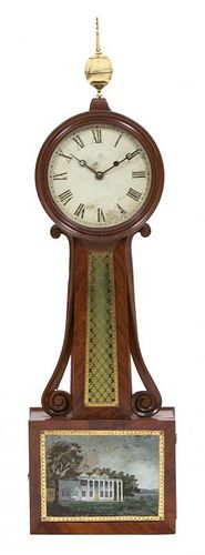 An American Federal Mahogany Banjo Clock Height 35 x width 10 x depth 3 1/2 inches.