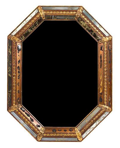 A Continental Cushion Giltwood Framed Octagonal Mirror Height 36 x width 27 inches.