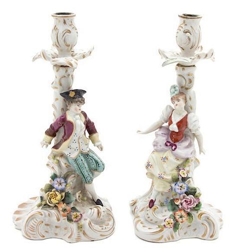 A Pair of Continental Porcelain Candlesticks Height 9 1/2 inches.