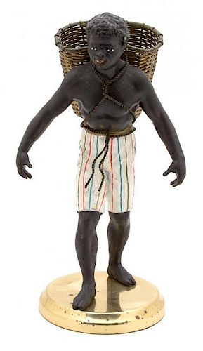 A Painted Blackamoor Figure Height 13 3/4 inches.