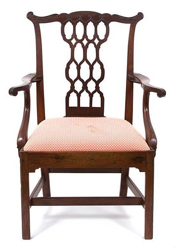 A Chippendale Style Mahogany Open Armchair Height 39 inches.