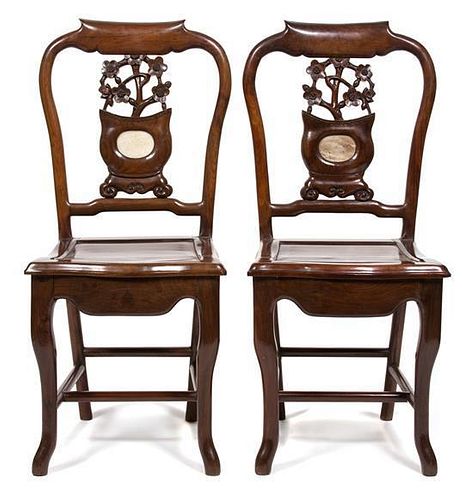 A Pair of Chinese Carved Hardwood Side Chairs Height 36 1/2 x width 16 1/4 x depth 16 1/2 inches.