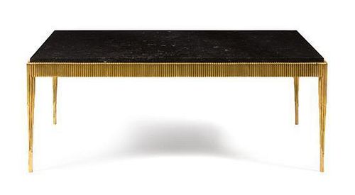 Style of Maison Bagues, c. 1970, a gilt bronze and black marble low table