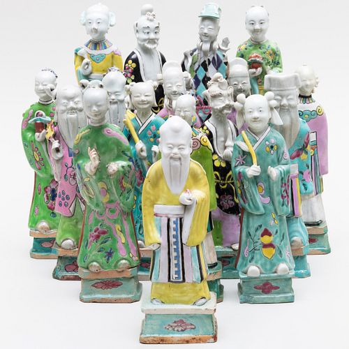 Assembled Group of Seventeen Famille Rose Porcelain Figures of Immortals
