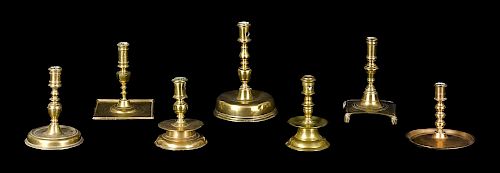 Seven Continental brass and bell metal candlesticks, 17th-19th c., tallest - 8 3/4'' h. Provenance:
