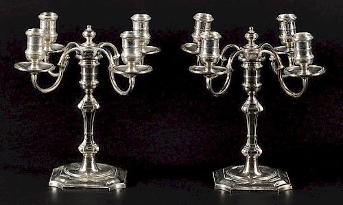 Pair of English silver candelabra, 1966, bearing the touch of James Robinson, 8 1/2'' h., 68.4 ozt.