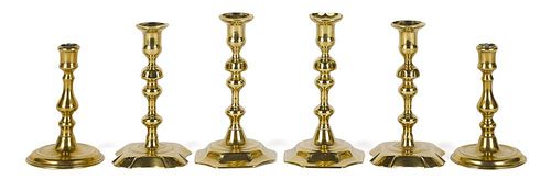 Three pairs of English Queen Anne brass candlesticks, 18th c., tallest - 7 1/4'' h. Provenance: Ren