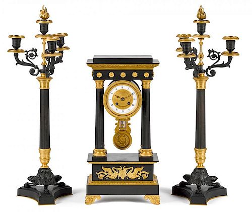 French ormolu and bronze portico clock garniture, early 20th c., 18 1/4'' h. and 24 1/2'' h.