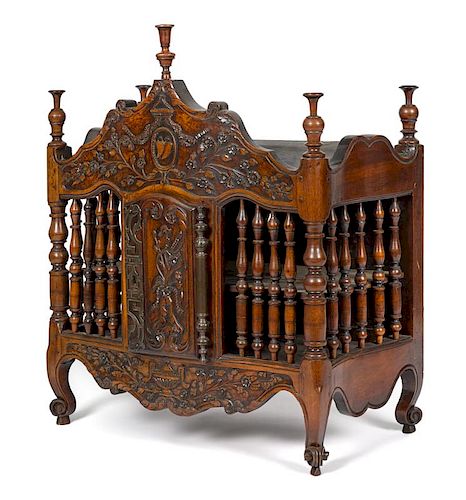 French walnut panetiere, ca. 1800, with heavily carved floral decoration, 37 1/2'' h., 33'' w. Prove