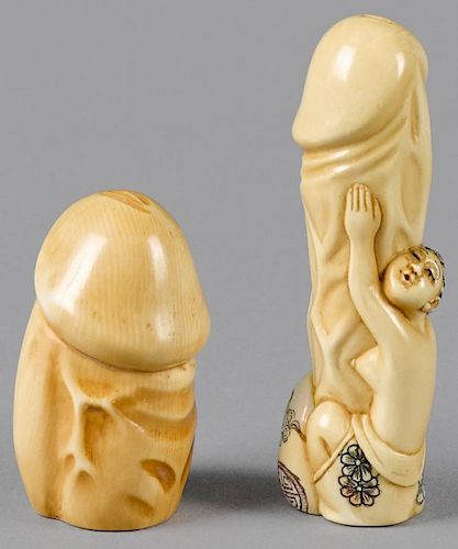 Two Japanese Meiji period carved ivory erotic phallus netsukes.