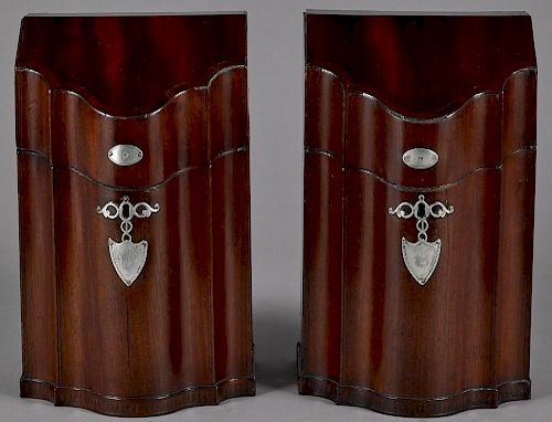 Pair of George III mahogany knife boxes, late 18th c., with silver mounts and a slide in fitted in