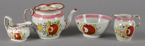 Queen's Rose pearlware teapot, 19th c., 5 1/2'' h., together with a waste bowl and two creamers.