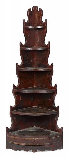 Painted pine corner shelf, early 19th c., with spurred sides and a single drawer in the base, reta