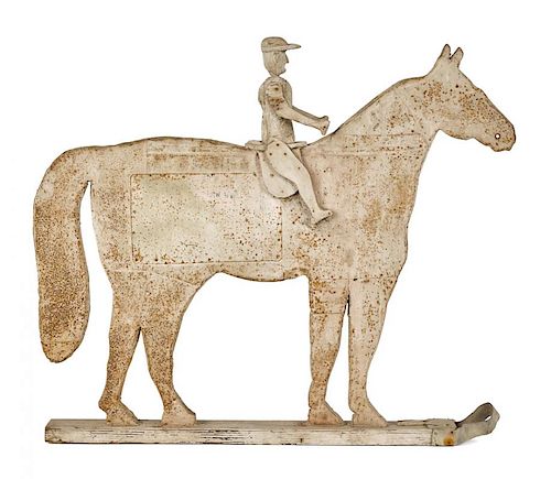 Pennsylvania painted horse and rider weathervane, early 20th c., with a carved wood figure atop a