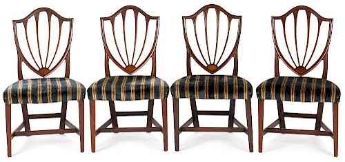 Set of four Hepplewhite mahogany dining chairs, early 19th c., with line and fan inlay.