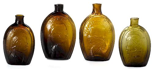 Four Historical amber and olive glass Washington and Jackson portrait flasks, tallest - 7''.