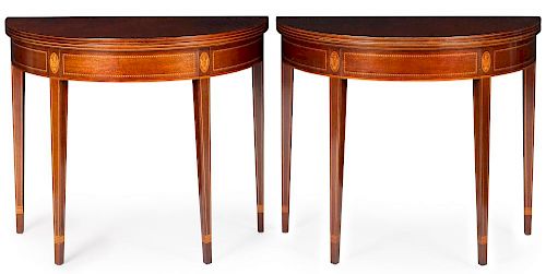 Pair of Kindel inlaid mahogany demilune card tables with eagle capitals, 29 1/2'' h., 34 3/4'' w.