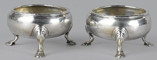 Pair of New York silver salts, ca. 1745, bearing the touch of George Ridout, 1 1/2'' h., 2 1/2'' w.,