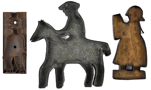 Three figural tinned iron cookie cutters, late 19th c., tallest - 12 1/2''.