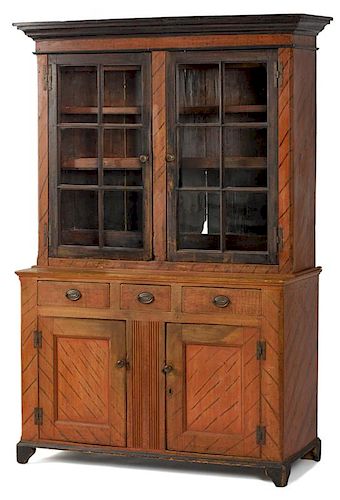 Pennsylvania painted poplar two-part Dutch cupboard, early 19th c., retaining an old salmon and bl