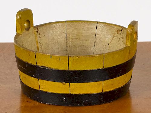 Painted pine staved tub, 19th c., retaining its original yellow surface with black bands, 4'' h., 7