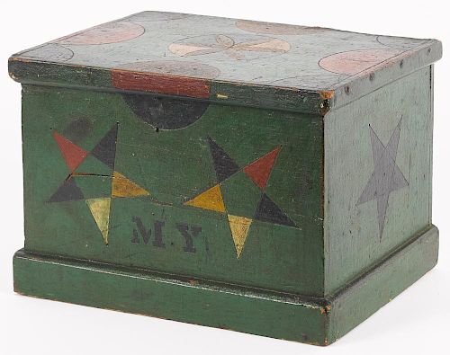 Painted pine lock box, late 19th c., retaining its original decoration of stars and circles on a g
