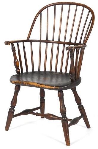 New England sackback Windsor armchair, ca. 1790, retaining an old dark varnished surface. Provenan