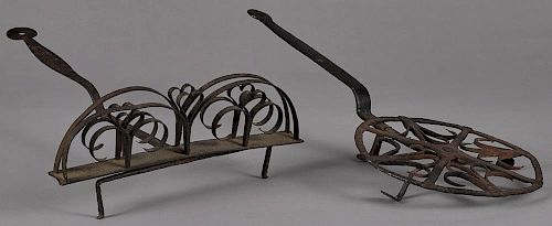 Two pieces of wrought iron, ca. 1800, one a toaster with repeated heart design, 20 1/2'' l., the ot