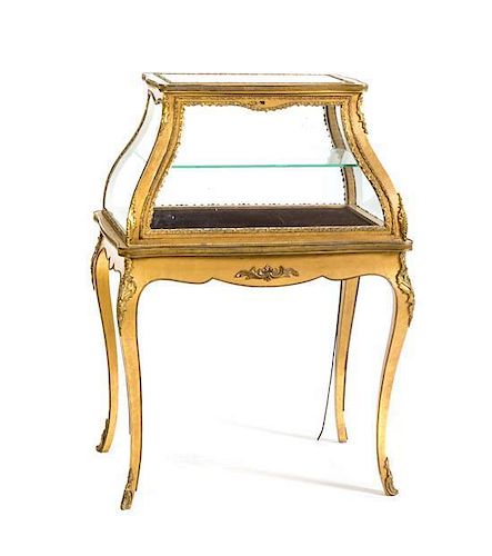 A Louis XVI Style Gilt Metal Mounted Vitrine, Height 44 x width 32 x depth 21 3/4 inches.