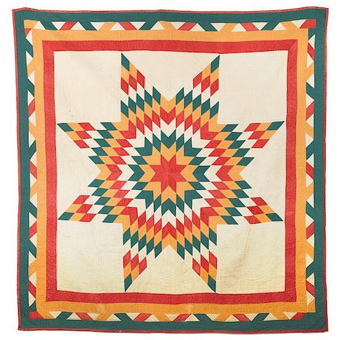 Pieced Lone Star quilt, early 20th c., 68'' x 66''.
