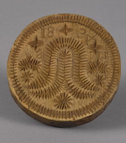 Carved and turned tulip butter print, dated 1834, initialed SM, 4 1/8'' dia.