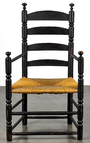 New England ladderback armchair, 18th c., retaining an old black surface. Provenance: Rentschler c