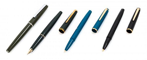 A Collection of Four Montblanc Fountain Pens Length of first 5 1/4 inches.